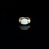 14k Yellow Gold 2.00ct Oval Opal/ .12ct Round Diamond and .10ct Round Rhodolite Garnet Ring